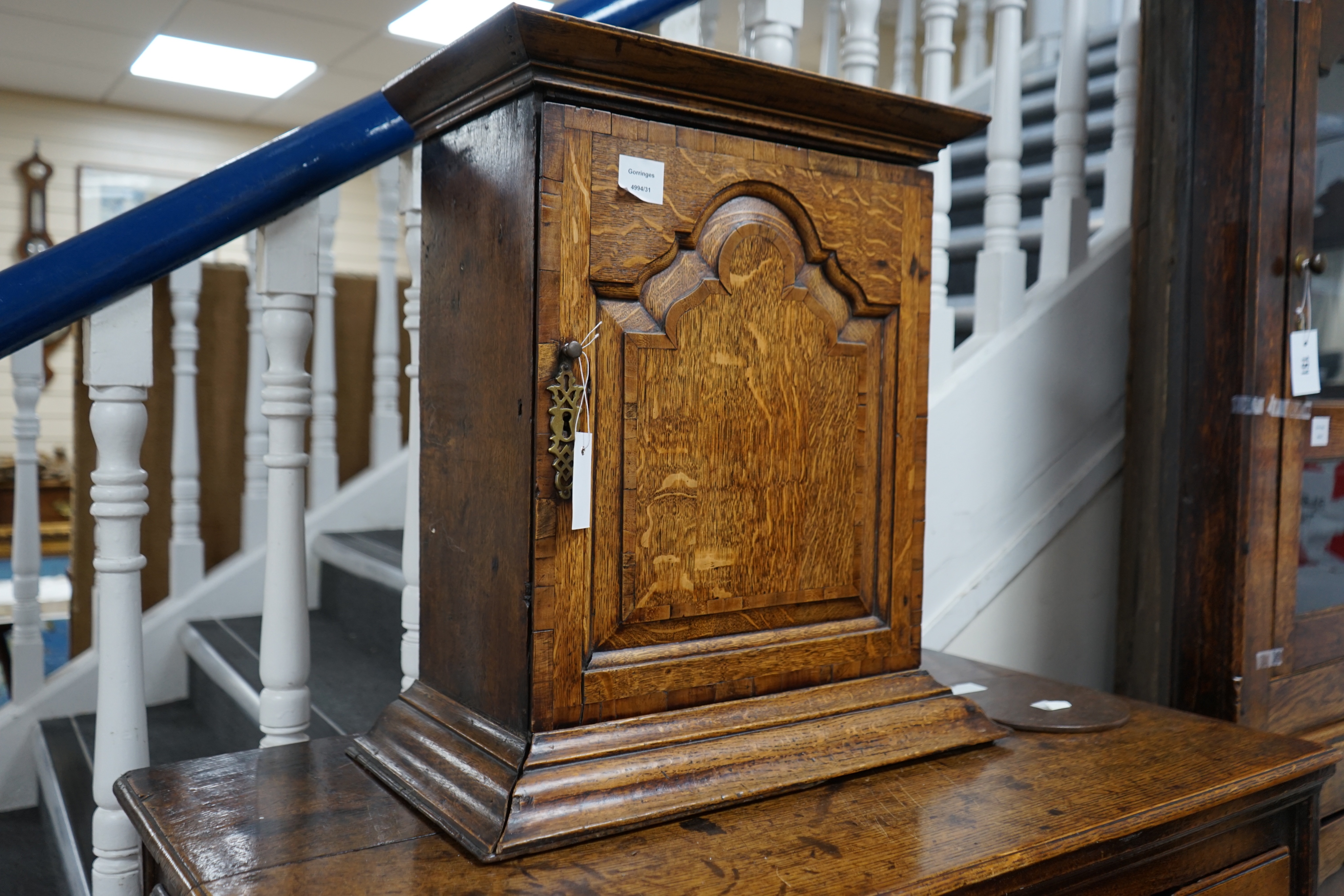 A18th century banded oak spice cupboard, with concealed drawer, width 53cm depth 29cm height 57cm